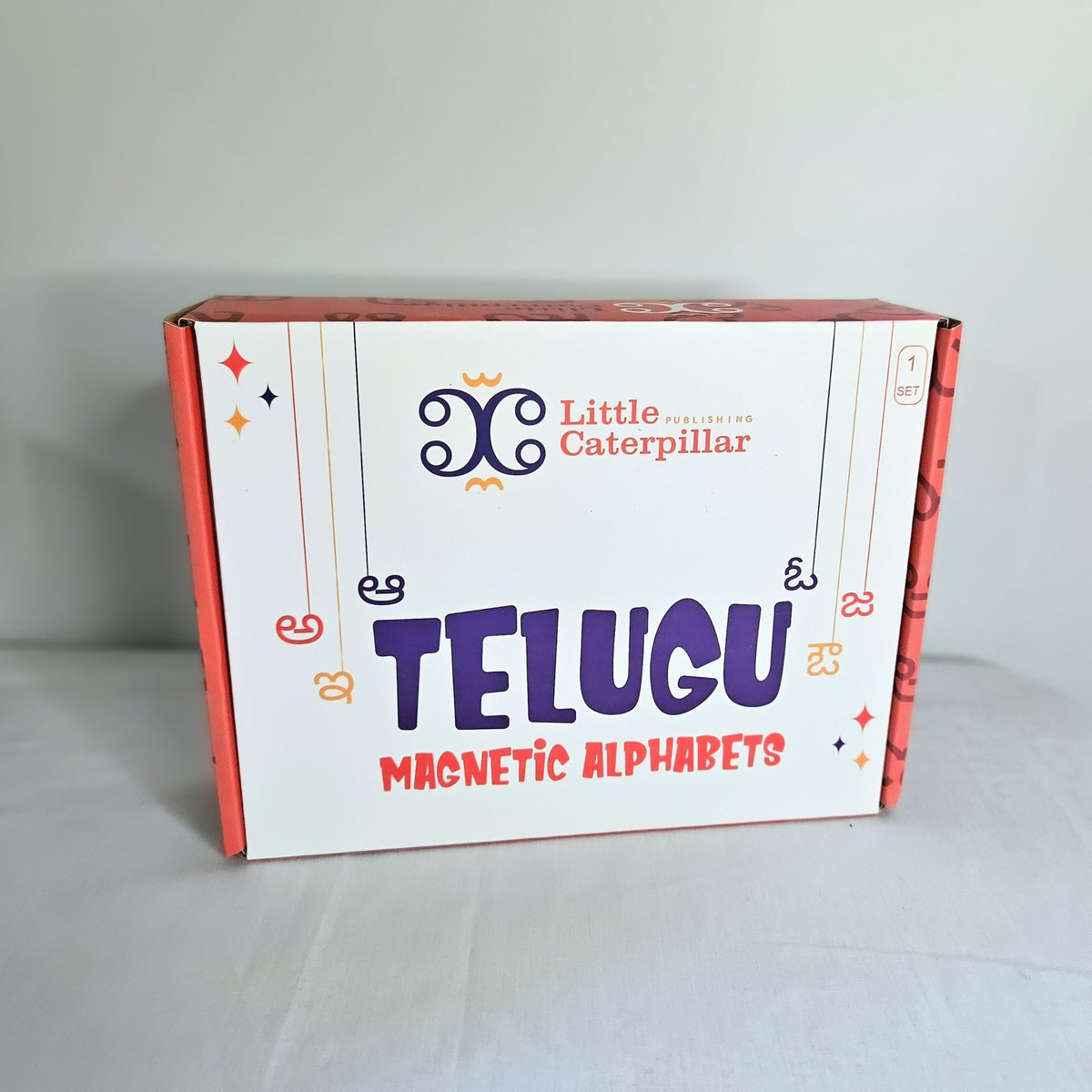Box of Telugu magnetic alphabets by Little Caterpillar on a white background